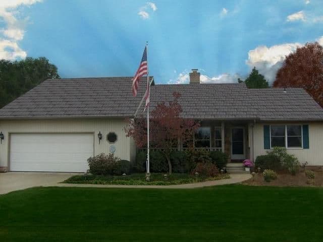 House with green lawn